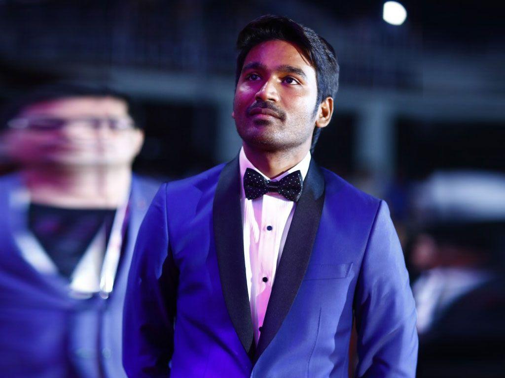 filmy4wap-dhanush in suit